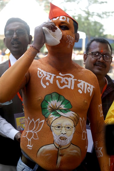 A Bharatiya Janata Party supporter attends a rally addressed by BJP leader and Prime Minister Narendra Modi in Barasat, West Bengal. EPA