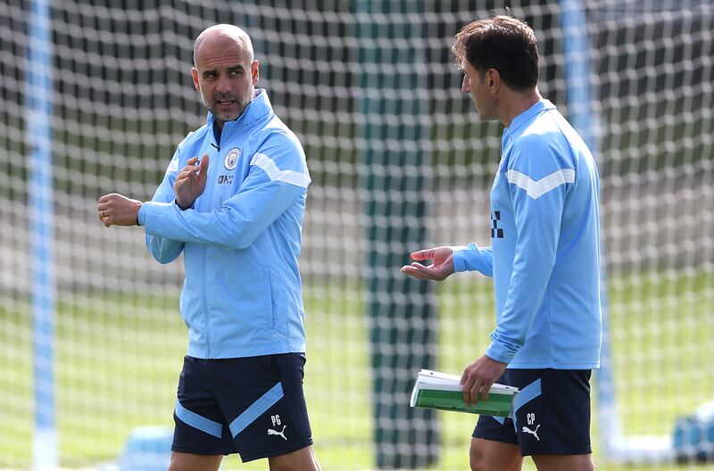 City manager Pep Guardiola and performance analysis coach Carles Planchart. PA