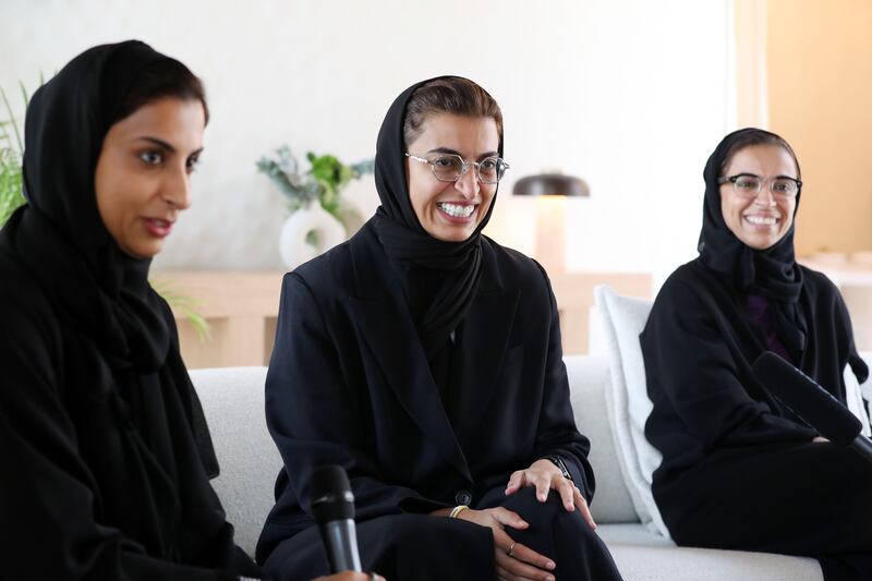 From left, Shaikha, Noura and Dr Fatima Al Kaabi celebrate Emirati Women's Day. All photos: Chris Whiteoak / The National