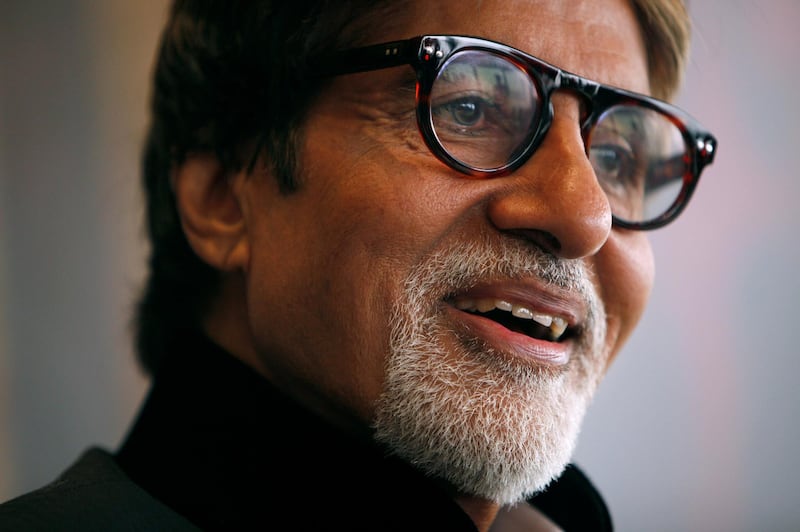 FILE PHOTO: Indian actor Amitabh Bachchan reacts during the Asian Film Awards news conference in Hong Kong March 23,2010. REUTERS/Tyrone Siu/File Photo