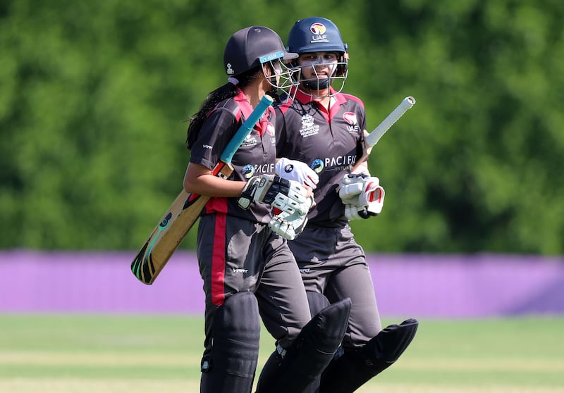 UAE's Chaya Mughal, right, and Priyanjali Jain after posting 131-4 in their Women's T20 World Cup Asia region qualifier in Dubai.