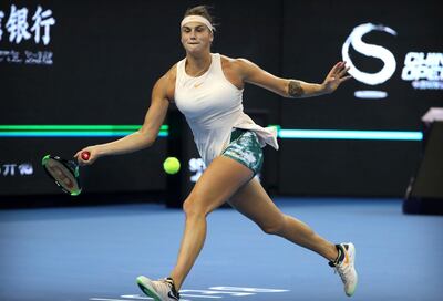 FILE - In this Oct. 5, 2018, file photo, Aryna Sabalenka of Belarus hits a return against Wang Qiang of China in their quarterfinal women's singles match at the China Open in Beijing. Sabalenka is one of the women to keep an eye on at the Australian Open, Jan. 14-27, 2019. (AP Photo/Mark Schiefelbein, File)