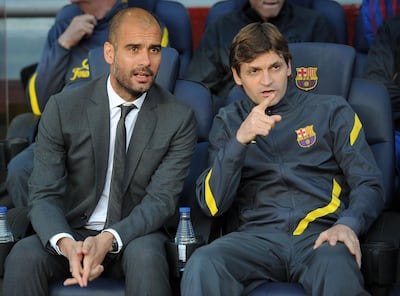 Sergi Samper trained under both Pep Guardiola, left, and Vilanova during his formative years at Barcelona. Lluis Gene / AFP