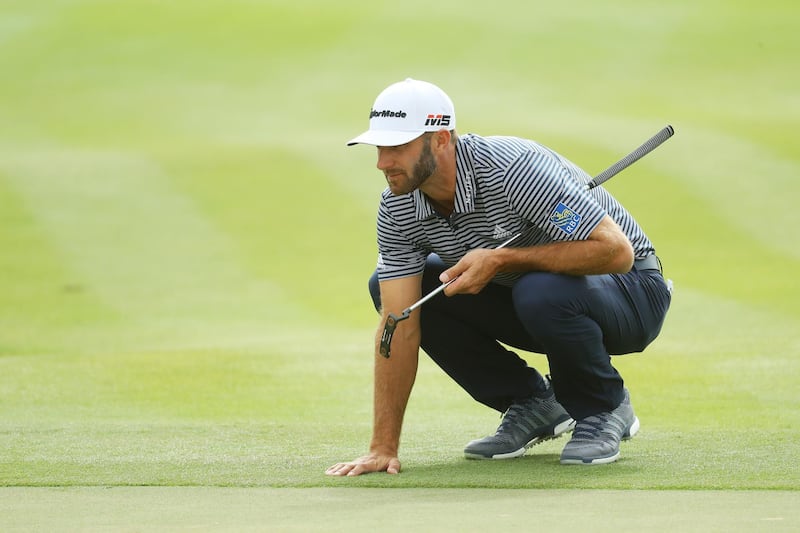 ABU DHABI, UNITED ARAB EMIRATES - JANUARY 19:  Dustin Johnson of the United States lines up a putt on the eighth green during Day Four of the Abu Dhabi HSBC Golf Championship at Abu Dhabi Golf Club on January 19, 2019 in Abu Dhabi, United Arab Emirates. (Photo by Warren Little/Getty Images)