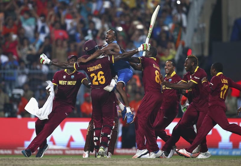 West Indies celebrate after Carlos Brathwaite hit the winning runs in the final. Getty