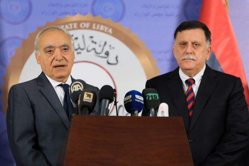 Ghassan Salame (L), Special Representative to the Secretary General of the United Nations for Libya, is greeted by Libya's UN-backed Prime Minister Fayez al-Sarraj ahead of a press conference on August 5, 2017, at the Prime Minister's office in Tripoli. / AFP PHOTO / MAHMUD TURKIA