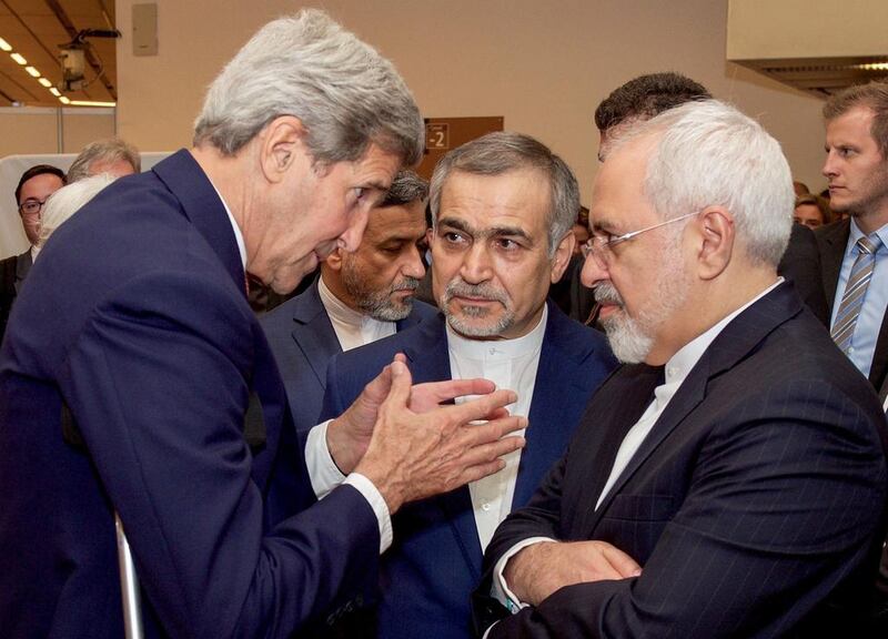 US secretary of state John Kerry speaks with Iranian foreign minister Javad Zarif. Reuters