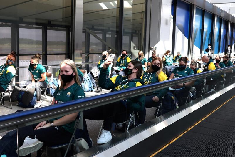 Australian softball national team players wait to take the quantitative antigen test after arriving at Narita Airport in Chiba prefecture, Japan. Reuters