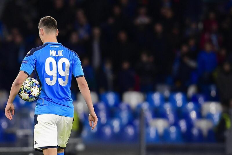 Napoli's Arkadiusz Milik, after scoring an hat-trick, leaves the pitch with the ball. EPA