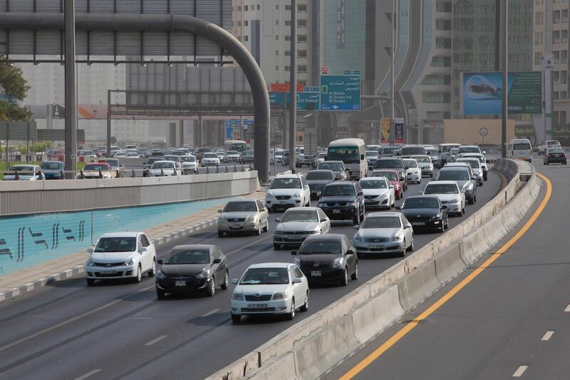 Dubai, United Arab Emirates - August 21, 2013.  E 11 or Al Ittihad Road one of the major thoroughfares connecting Dubai and Northern Emirates is seen as traffic is slowly building up heading towards Dubai, while on the other side heading towards Sharjah traffic was light and smooth.  ( Jeffrey E Biteng / The National )  Editor's Note;  No reporter's name available on the list. *** Local Caption ***  JB210813-Traffic02.jpg