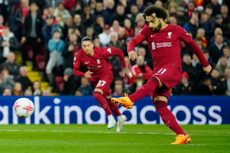 Liverpool's Mohamed Salah scores the winner against Fulham from the penalty spot in the Premier League game at Anfield on Wednesday, May 3, 2023. AP 