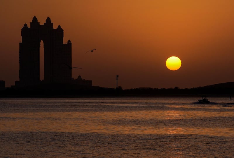 Abu Dhabi, United Arab Emirates, January 30, 2021.  Abu Dhabi residents enjoy the sunset along the Corniche on a Saturday evening.Victor Besa/The National For:  Stand alone/Stock Images