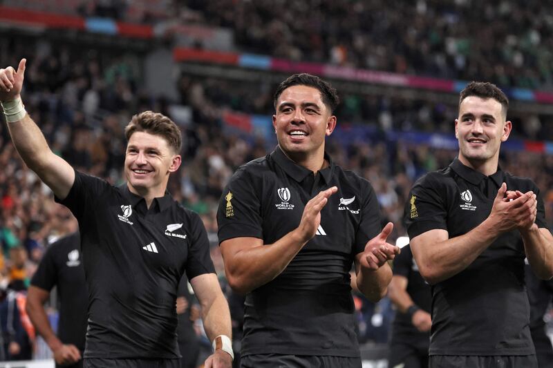 New Zealand players celebrate after winning their 2023 Rugby World Cup quarter-final match against Ireland. AFP