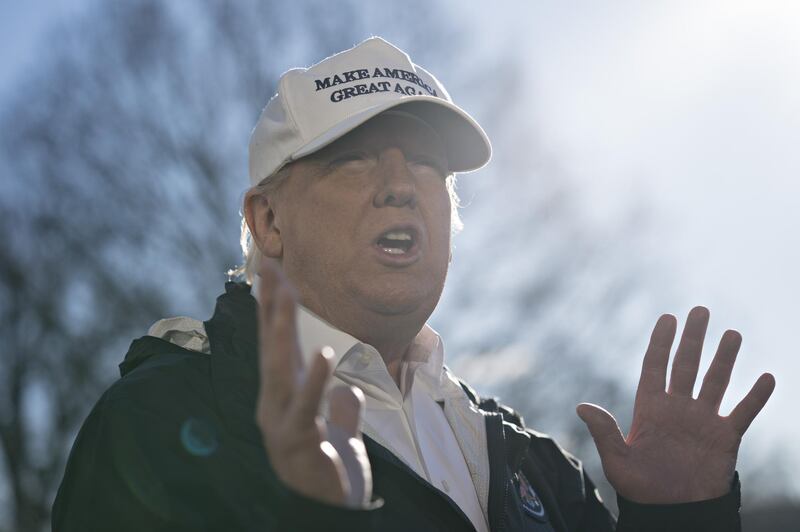 U.S. President Donald Trump speaks to members of the media on the South Lawn of the White House before boarding Marine One in Washington, D.C., U.S., on Thursday, Jan. 10, 2019. Trump heads to Texas to rally support for building a border wall a day after walking out of talks with congressional leaders on ending a partial government shutdown. The shutdown entered its 20th day on Thursday as its impact is more widely felt. Photographer: Andrew Harrer/Bloomberg