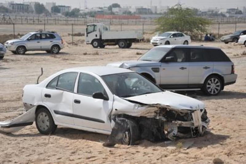 Police say at least 50 vehicles were involved in a chain-reaction crash in dense fog on the main highway between Dubai and Abu Dhabi, leaving dozens of people injured. The pileup Saturday extended for more than 500 yards (meters) and included cars, buses and vans. Photo Courtesy Abu Dhabi Police