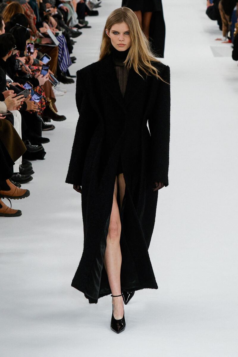 At Givenchy, men's overcoats were prominent, darted at the waist for shape. AFP