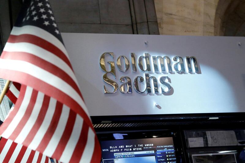 FILE PHOTO: A view of the Goldman Sachs stall on the floor of the New York Stock Exchange in New York, U.S., July 16, 2013. REUTERS/Brendan McDermid/File Photo