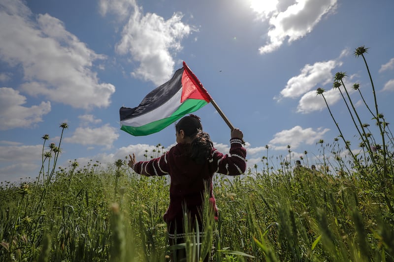 A Palestinian during a protest marking 'Land Day' along the border between Israel and the Gaza Strip. EPA