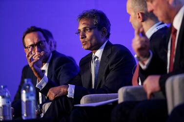 Acwa Power president and chief executive Paddy Padmanathan, centre. On Monday, Acwa Power achieved financial closure on a $650m desalination project in Jubail. Antonie Robertson/The National
