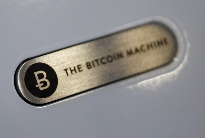 A close-up view of a Bitcoin ATM is pictured at the opening of the Ducatus cafe, a cashless cafe that accepts cryptocurrencies such as Bitcoin, in Singapore December 21, 2017. REUTERS/Edgar Su