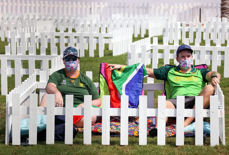 South Africa supporters masks sit inside small fences, erected for supporters to maintain social distancing at the Zayed Cricket Stadium in Abu Dhabi. EPA