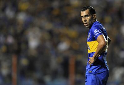 Footballer Carlos Tevez, who plays for Boca Juniors, has filed a court injunction to avoid paying Argentina's new wealth tax. AFP 