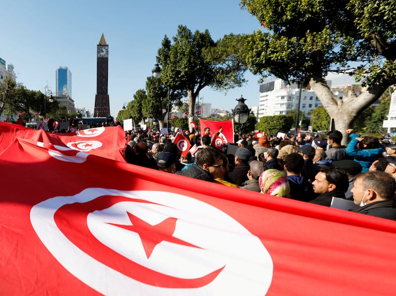 People protest against Tunisian President Kais Saied's seizure of governing power. Reuters