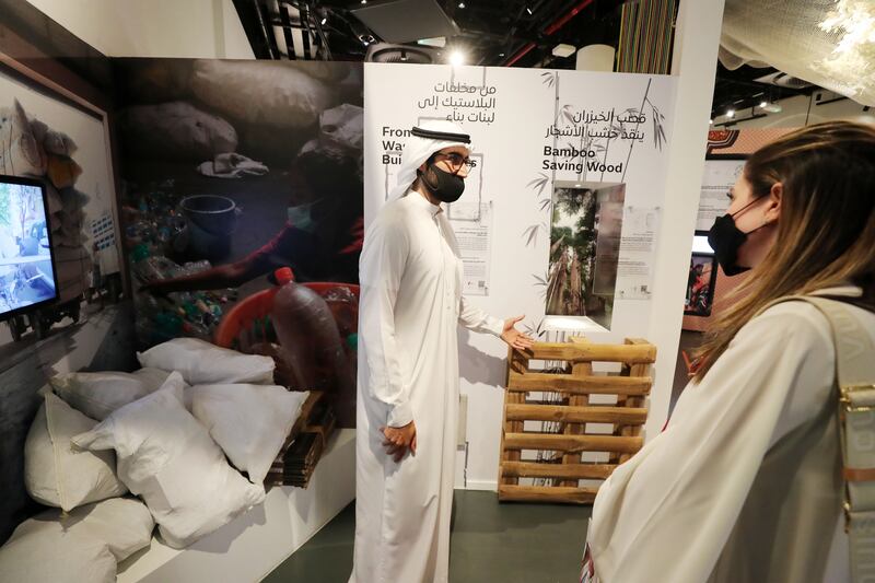 Abdulla Khoory, senior manager of Expo Live, speaks to visitors about projects that affect lives across the world at The Good Place pavilion.