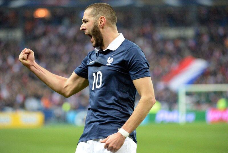 Karim Benzema and France beat Netherlands 2-0. They'll play in Group E at the 2014 World Cup with Switzerland, Ecuador and Honduras. Damien Meyer / AFP
