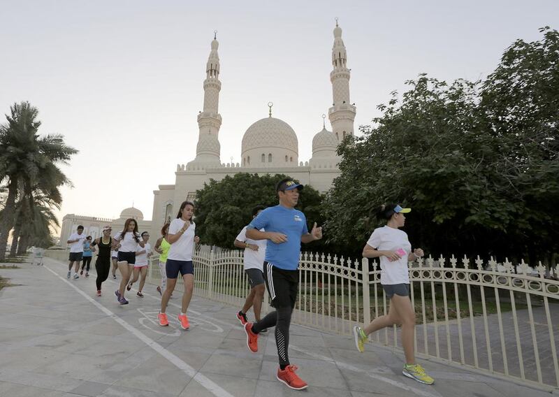 RUNmadan invites runners to cover between five and 16 kilometres a day while visiting neighbourhood mosques. Jeffrey E Biteng / The National
