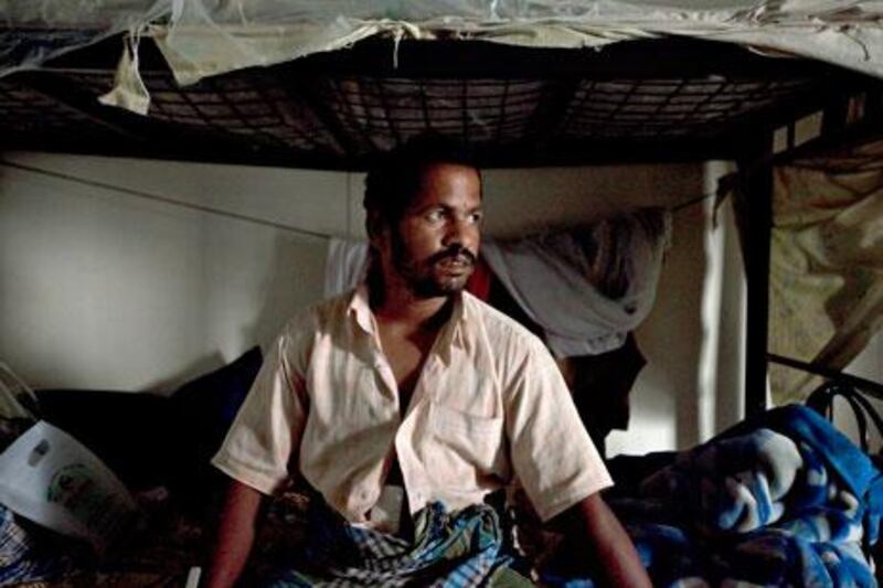 Muthu Kannan, pictured here in his living quarters on August 6, has applied to UAE authorities to let him, and the other fishermen injured in the US Navy shooting incident off the Dubai to travel home to India.