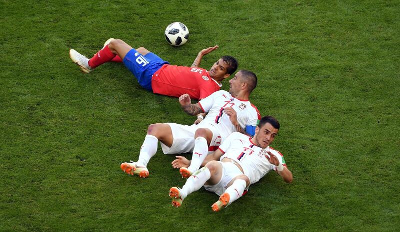 SAMARA, RUSSIA - JUNE 17:  Cristian Gamboa of Costa Rica is challenged by Aleksander Kolarov (c) and Fiilip Kostic of Serbia during the 2018 FIFA World Cup Russia group E match between Costa Rica and Serbia at Samara Arena on June 17, 2018 in Samara, Russia.  (Photo by Stu Forster/Getty Images)