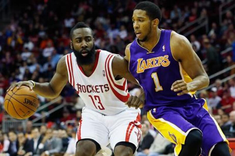 Houston's James Harden drives against Darius Morris of the Los Angeles Lakers.