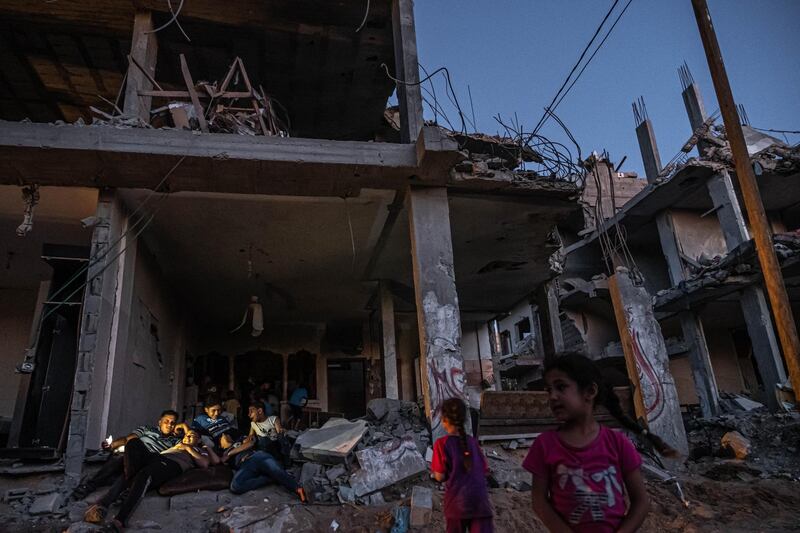 Life resumes amid the rubble of destroyed homes in Beit Hanoun, Gaza. Getty