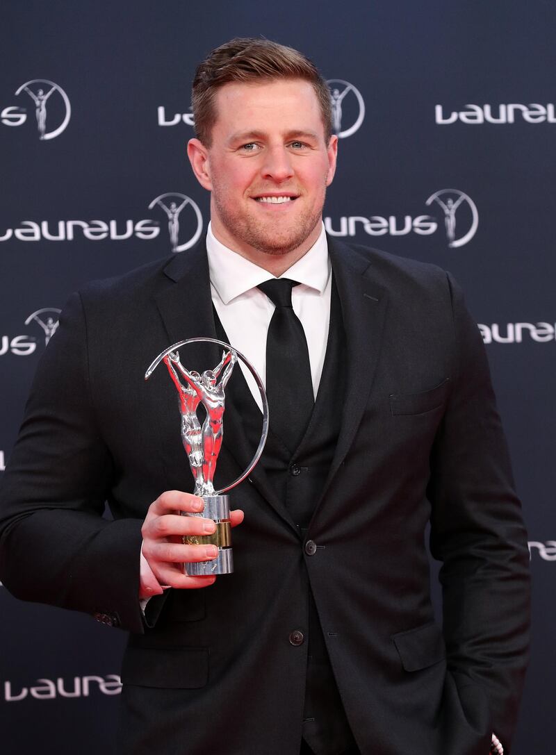 epa06569226 US football player Justin James 'J. J.' Watt poses with the 'Laureus Sporting Inspiration Award' at the 2018 Laureus World Sports Awards in Monaco, 27 February 2018. The annual Laureus Awards are held to honor people whom make a notable impact and remarkable accomplishments in the world of sport throughout the year.  EPA/SEBASTIEN NOGIER