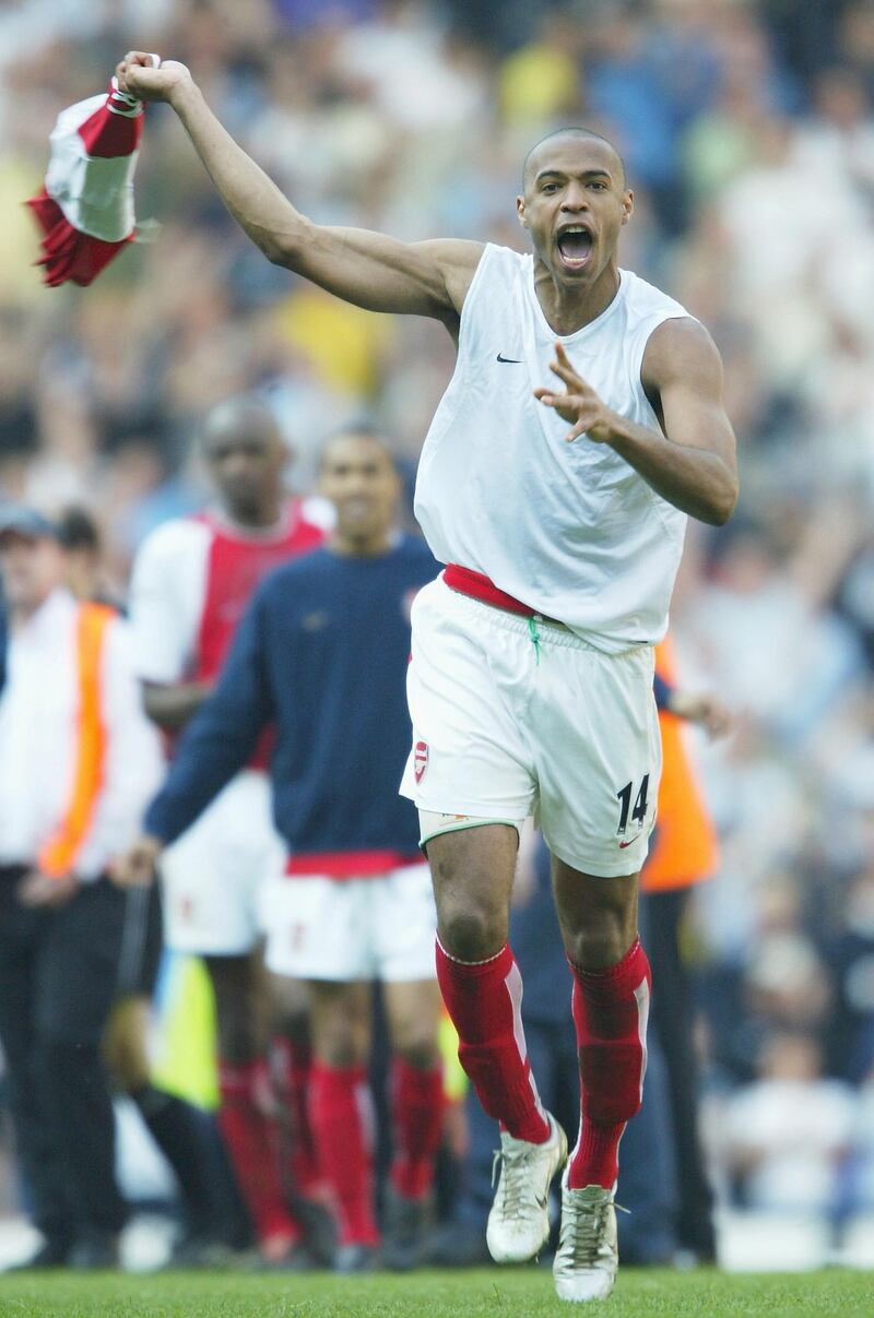 LONDON - APRIL 25:  Thierry Henry of Arsenal celebrates at the end off the FA Barclaycard Premiership match between Tottenham Hotspur and Arsenal at White Hart Lane on April 25, 2004 in London.  (Photo by Shaun Botterill/Getty Images)