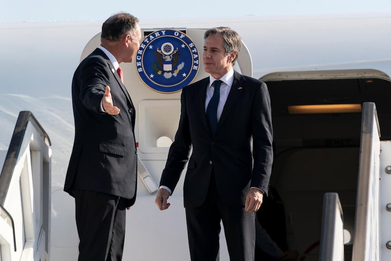 US Secretary of State Antony Blinken is greeted by Israeli Chief of State Protocol Gil Haskel, as he steps off the plane upon arrival at Ben Gurion International Airport near Tel Aviv. Reuters