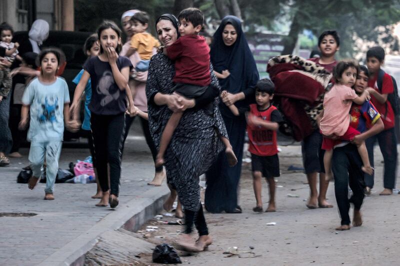 Women and children in Gaza City. AFP