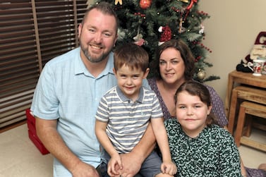 Chris Bradwell, owner of British Dads Dubai, with wife Stacey, son Thomas, four, and daughter Izzy, 10. Despite losing his job earlier this year, Mr Bradwell says he and Stacey have made sure their children won’t go without gifts this Christmas. Chris Whiteoak / The National