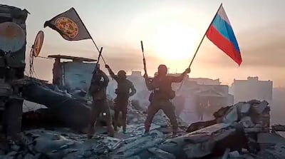 Wagner mercenaries celebrate the capture of Bakhmut in Ukraine in May. AP