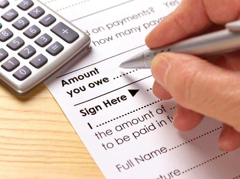 Debt consolidation form. Getty Images