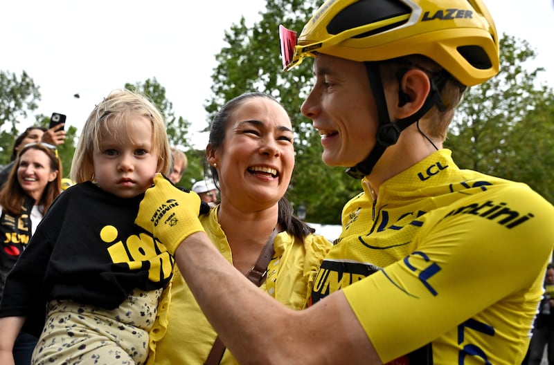 Tour de France winner Jonas Vingegaard celebrates with his family. EPA