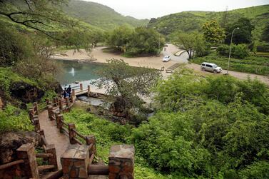 Tourists visit a cave at Ain Razat, a water spring in Salalah, Dhofar province, Oman, August 2016. Reuters