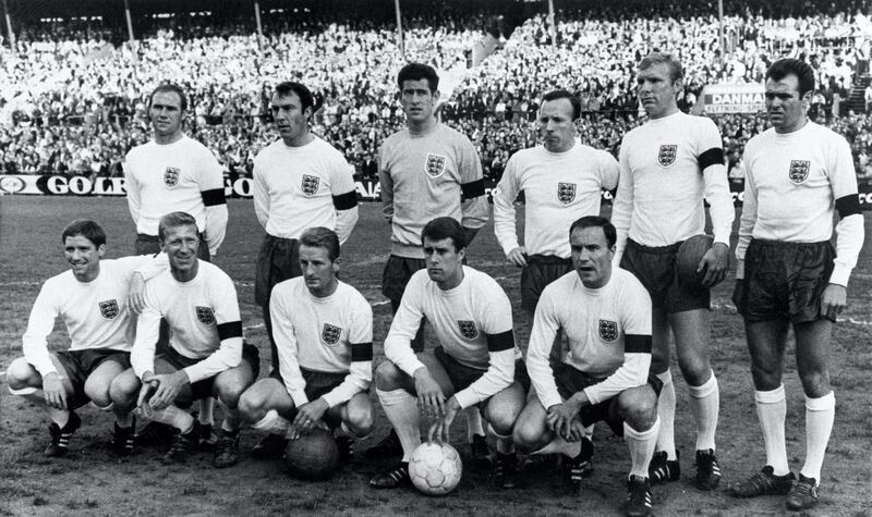 The English national soccer team players pose for a group picture after their victory over Denmark in the pre World Cup friendly in Idraetsparken in 1966. English won the match 2-0 with goal scored by John (Jackie) Charlton and George Eastham. Standing, left-to-right: Ray Wilson, Jimmy Greaves, Paul Bonetti, Nobby Stiles, Bobby Moore (captain), John Connelly; Front row: Alan Ball, Jacky Charlton, George Eastham, Geoff Hurst, George Cohen. Absents on the picture: Gordon Banks, Bobby Charlton, Martin Peters and Roger Hunt. (Photo by STF / AFP)