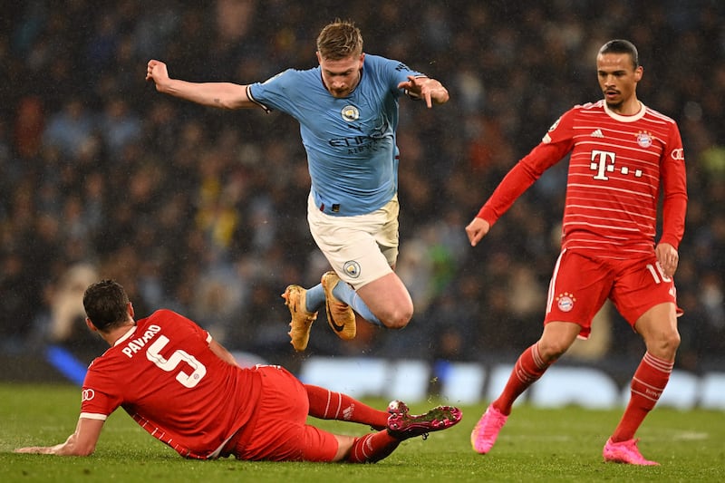 Manchester City's Kevin De Bruyne takes on Bayern Munich's Benjamin Pavard and Leroy Sane. AFP