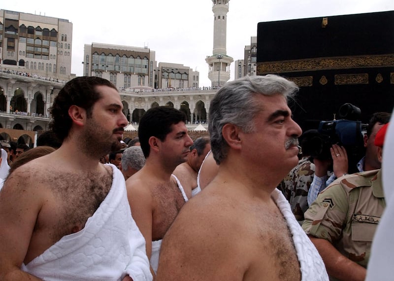 Former Lebanese prime minister Rafik Hariri and his sons Saad, left and Bahaa, centre, perform Umrah at the Grand Mosque in Makkah, Saudi Arabia, in 2003. Saad would go on to become prime minister in 2009, four years after the assassination of his father.  All photos: AFP