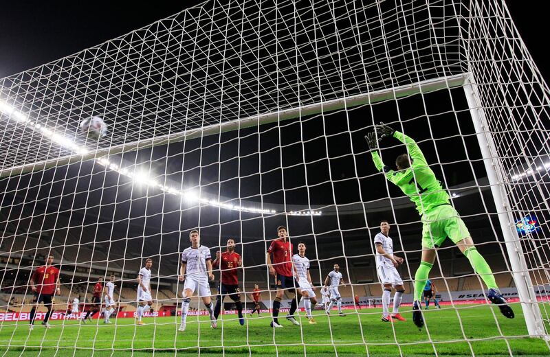 Spain's Alvaro Morata scores their first goal. Reuters