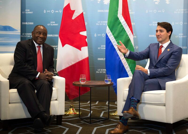 Prime Minister Justin Trudeau, right, meets with the President of South Africa, Cyril Ramaphosa, during a bilateral meeting as part of the G-7, Sunday, June 10, 2018, in Quebec City. (Jacques Boissinot/The Canadian Press via AP)