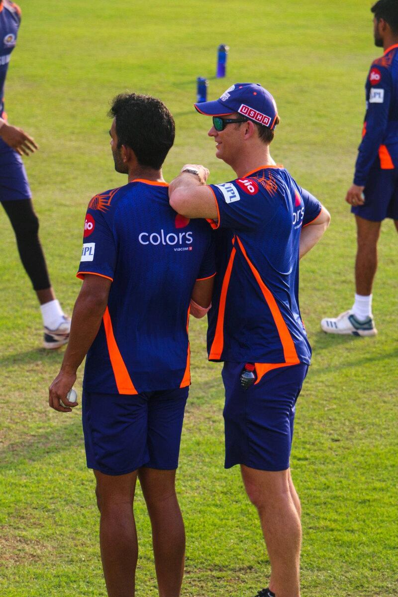 Bowling coach Shane Bond gives advice. Courtesy Abu Dhabi Cricket