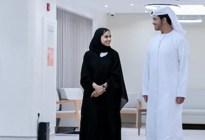 Athari Al Hosani, pictured left, is a guest services executive at Burjeel Medical City. Photo: Burjeel Medical City
